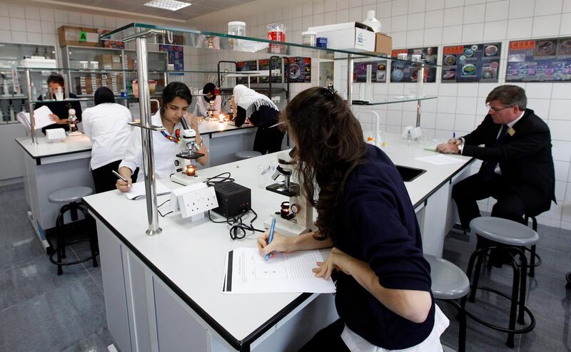 Dubai, 28th November 2010.  The Lead Inspector from Dubai School Inspection Bureau was at hand to observe the ongoing Advanced Placement Biology laboratory exercises of the grade 12 students, held at the Al Mizhar American Academy for Girls.  (Jeffrey E Biteng / The National)