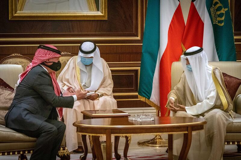 Jordan's King Abdullah II meets Kuwait's new Emir Sheikh Nawaf Al Sabah and offers condolences, at the Emiri Terminal of Kuwait International Airport. AFP