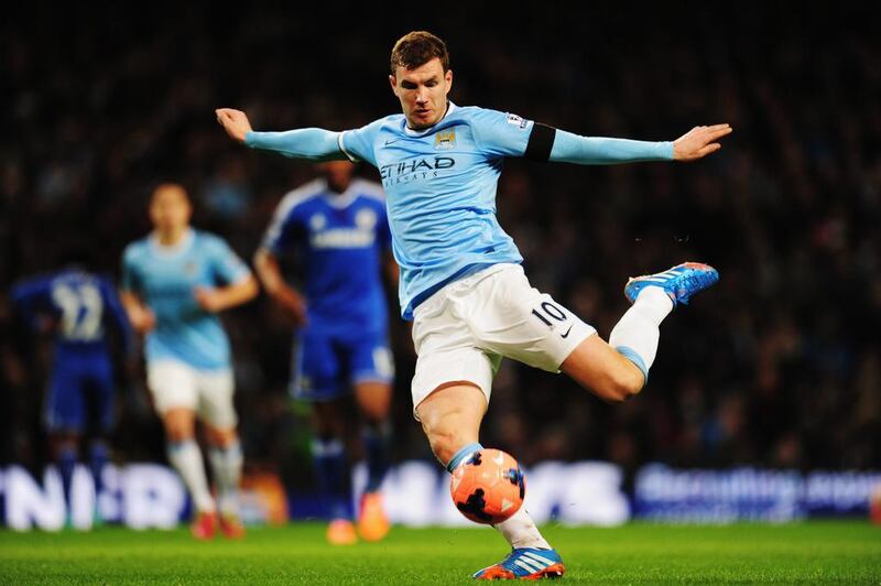 Dzeko shoots on goal during the match on Saturday. Shaun Botterill / Getty Images
