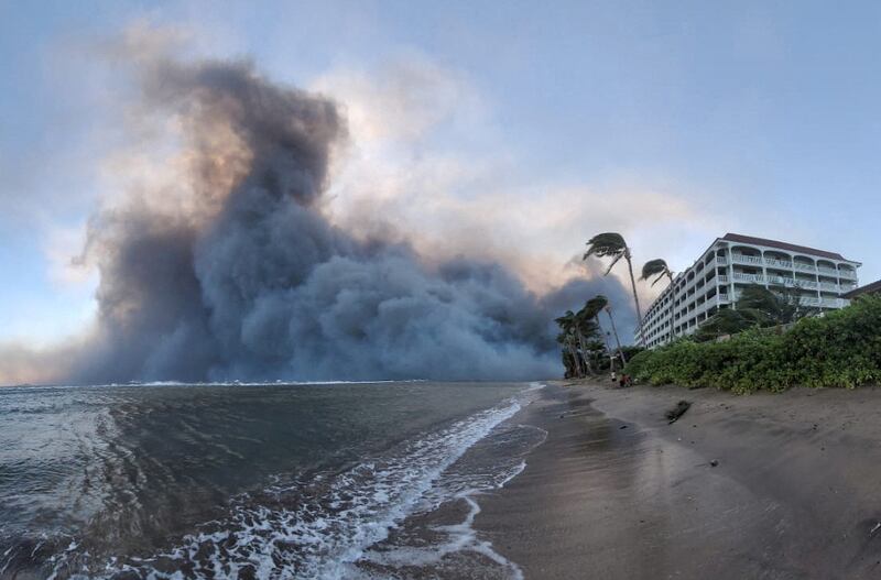 Smoke billows as wildfires driven by high winds destroy a large part of Lahaina. Reuters