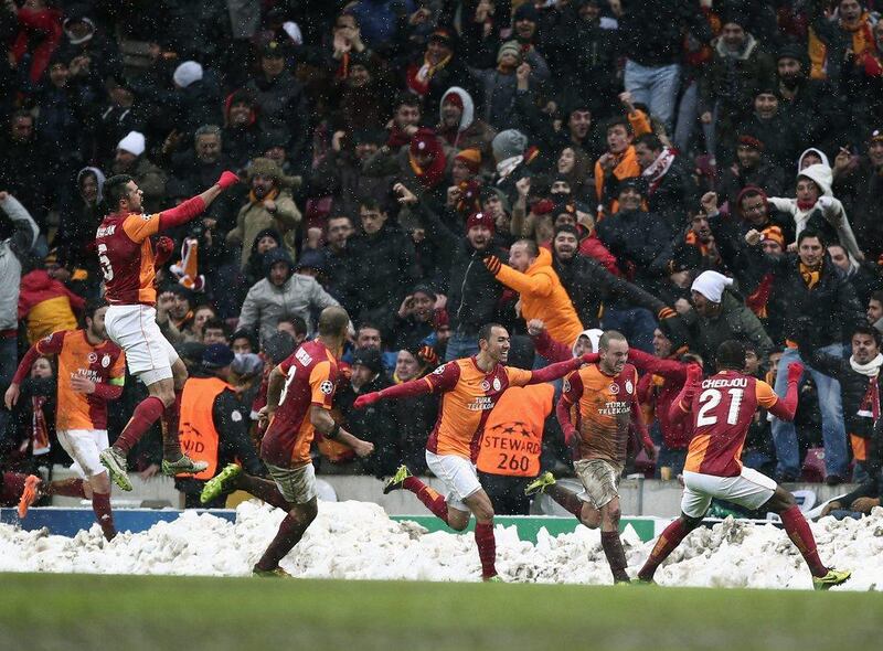 Galatasaray 1-0 Juventus. In a match suspended due to heavy snowfall the night before, the Turkish side emerged victorious thanks to Wesley Sneijder's 85th-minute strike. AP Photo