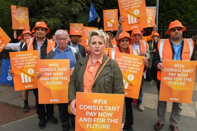 Medical consultants of the British Medical Association union on the picket line outside Manchester Royal Infirmary on Thursday. PA