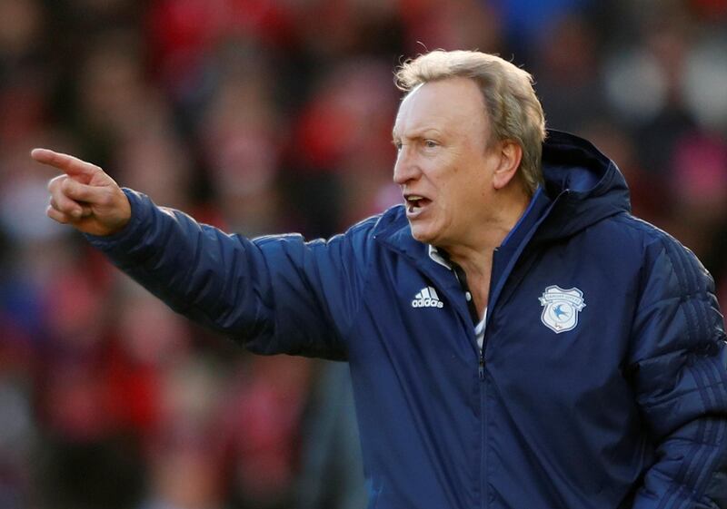 Cardiff City manager Neil Warnock gives instructions to his players from the touchline. Reuters