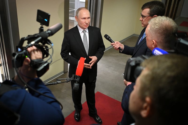 Russian President Vladimir Putin answers journalists' questions in Moscow. AP
