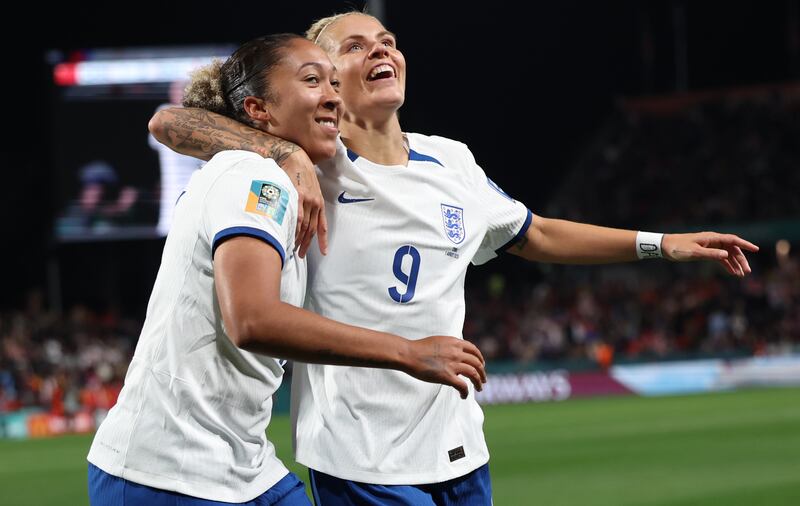 Lauren James, left, celebrates scoring England's fourth goal with Rachel Daly in their 6-1 Women's World Cup win over China. PA