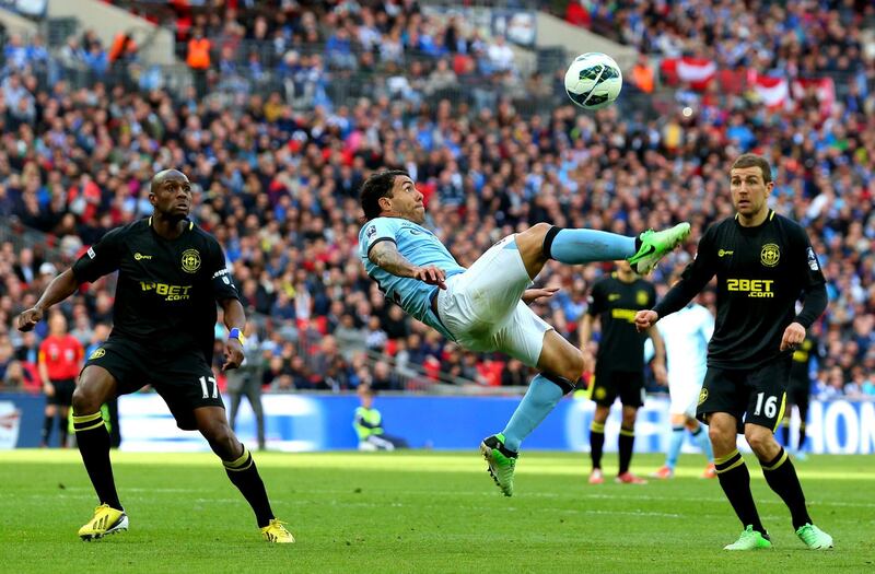 LONDON, ENGLAND - MAY 11:  Carlos Tevez of Manchester City  attempts an overherad kick during the FA Cup with Budweiser Final between Manchester City and Wigan Athletic at Wembley Stadium on May 11, 2013 in London, England.  (Photo by Alex Livesey/Getty Images)