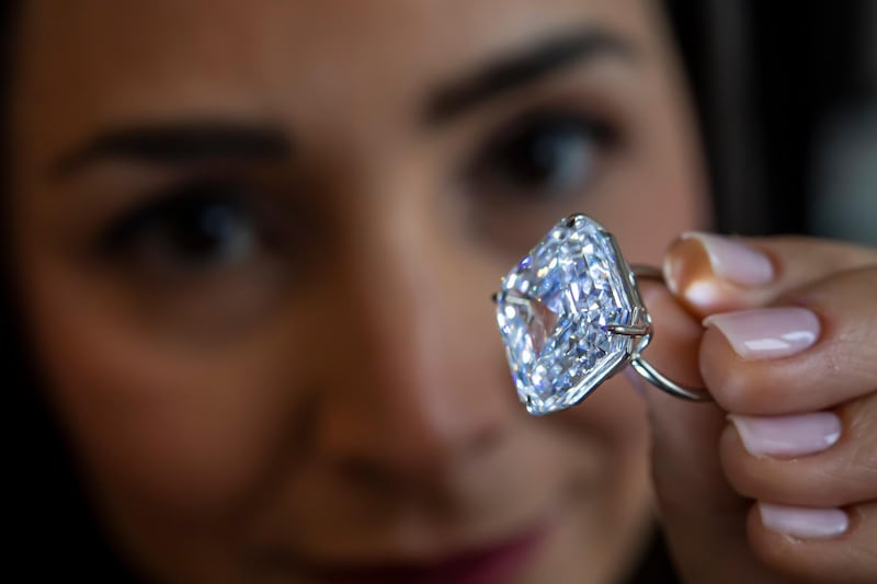 A diamond ring set with a 40.08 carat square emerald-cut D colour flawless IIa diamond. It is estimated to sell for between $3.7 million - $4.5 million US Dollars. AP Photo