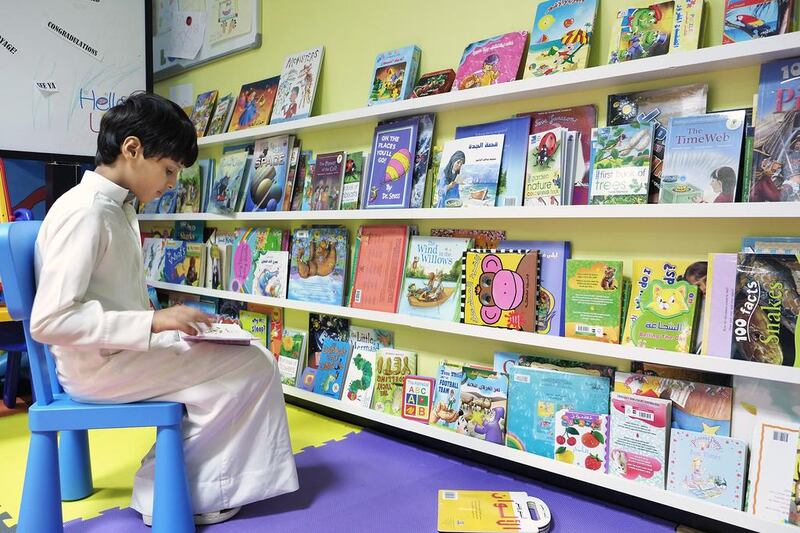 Saeed Abuod, a patient at Mafraq Hospital, likes the children’s library. Delores Johnson / The National 