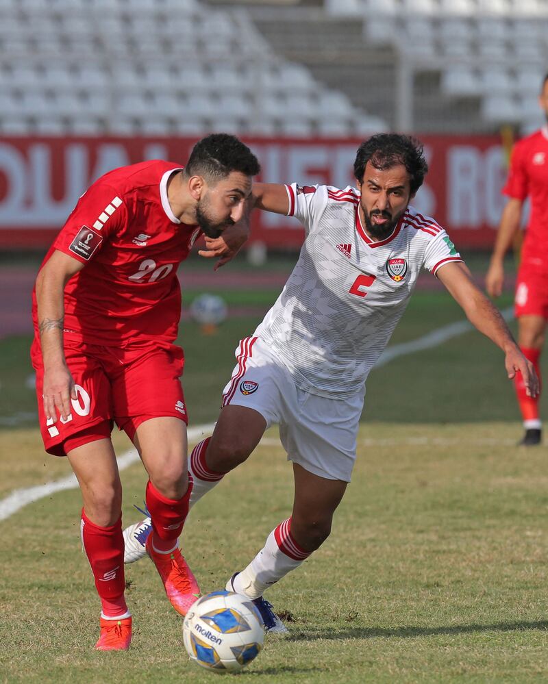 Lebanon forward Rabih Ataya battles for the ball with UAE's Mohammed Barqesh. AFP