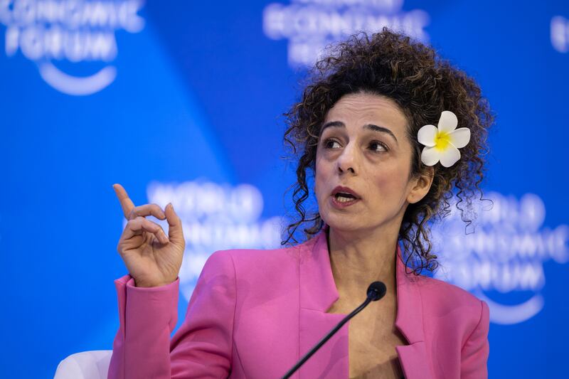 Iranian-American journalist and women's rights activist Masih Alinejad takes part in an interview with a TV news channel in Davos. AFP