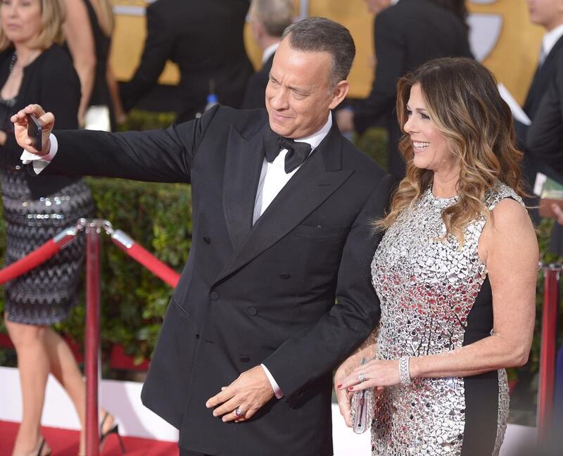 US actor Tom Hanks and his wife Rita Wilson arrive.  EPA 
