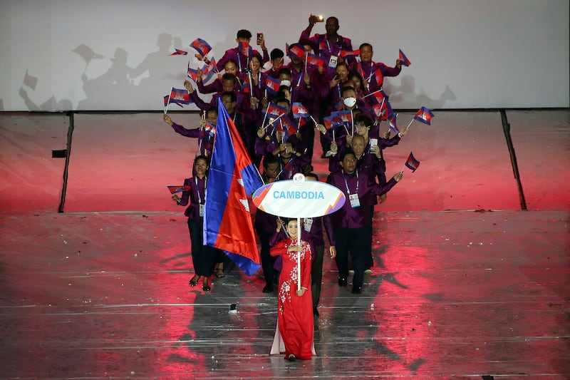 The Cambodian delegation enters the stage during the 31st Southeast Asian Games opening ceremony. AP
