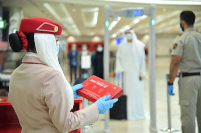 All Emirates passengers will be given a complimentary hygiene kit before boarding flights. Transit passengers can request a new kit before boarding connecting flights. Courtesy Emirates