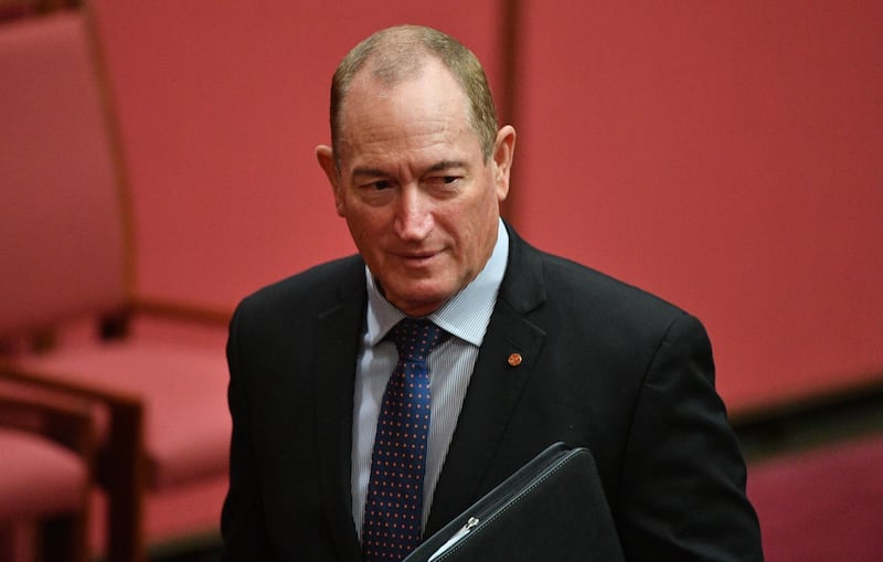 epa06950495 Katter's Australian Party Senator Fraser Anning leaves after a Greens censure motion against Senator Anning in the Senate chamber at Parliament House in Canberra, Australia, 15 August 2018. During his speech on 14 August 2018, Anning suggested a majority of Australians may want to return to the discarded 'White Australia' immigration policy, and that the 'final solution' for Australia's immigration policy is a referendum. The term 'final solution' was a phrase used by Adolf Hitler in Nazi Germany to describe the program of mass murder of the Jewish people. Prime Minister Turnbull condemned the speech.  EPA/MICK TSIKAS  AUSTRALIA AND NEW ZEALAND OUT