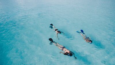 Jumeirah Maldives offers guests unlimited access to the surrounding Indian Ocean. Photo: Unsplash / Ishan See from the Sky