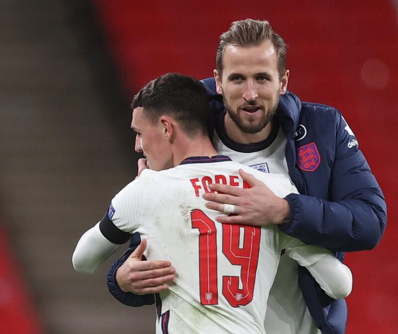 Phil Foden and Harry Kane celebrate after the match. Reuters