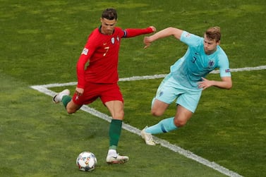 Soccer Football - UEFA Nations League Final - Portugal v Netherlands - Estadio do Dragao, Porto, Portugal - June 9, 2019 Portugal's Cristiano Ronaldo in action with Netherlands' Matthijs de Ligt REUTERS/Susana Vera