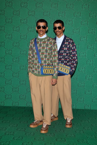 Twins Hadban at the Gucci show. Getty Images