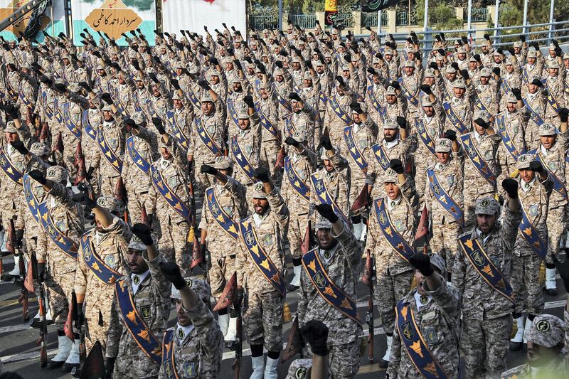 A handout picture provided by the Iranian presidency on September 22, 2019 shows members of Iran's Islamic Revolutionary Guard Corps (IRGC) giving a military salute during the annual "Sacred Defence Week" military parade marking the anniversary of the outbreak of the devastating 1980-1988 war with Saddam Hussein's Iraq, in the capital Tehran. - Rouhani said on September 22 that the presence of foreign forces creates "insecurity" in the Gulf, after the US ordered the deployment of more troops to the region. "Foreign forces can cause problems and insecurity for our people and for our region," Rouhani said in a televised speech at the annual military parade, adding that Iran would present to the UN a regional cooperation plan for peace. (Photo by - / Iranian Presidency / AFP) / === RESTRICTED TO EDITORIAL USE - MANDATORY CREDIT "AFP PHOTO / HO / IRANIAN PRESIDENCY" - NO MARKETING NO ADVERTISING CAMPAIGNS - DISTRIBUTED AS A SERVICE TO CLIENTS ===