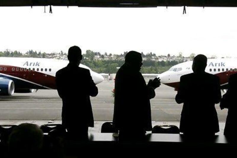 Etihad has reached an understanding with the Nigerian airline Arik Air involving both airlines helping to attract passengers on to each other's flights. Ted S Warren / AP Photo