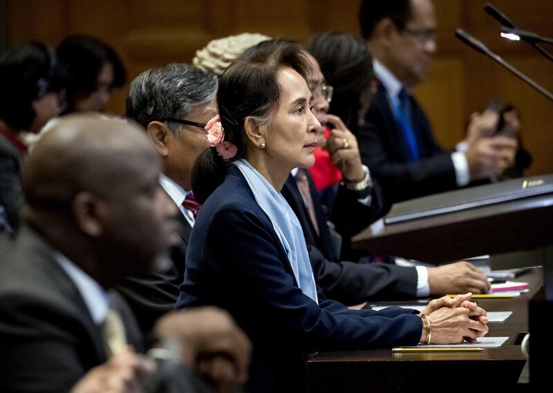 epa08062118 Abubacarr Tambadou (L front, seated), minister of justice of The Gambia, and Aung San Suu Kyi (C), Myanmar State Counselor, on the second day before the International Court of Justice (ICJ) in the Peace Palace, The Hague, The Netherlands, 11 December 2019. Myanmar State Counselor Aung San Suu Kyi defended her country at the International Court of Justice against accusations of genocide filed by The Gambia, following the 2017 Myanmar military crackdown on the Rohingya Muslim minority.  EPA/KOEN VAN WEEL