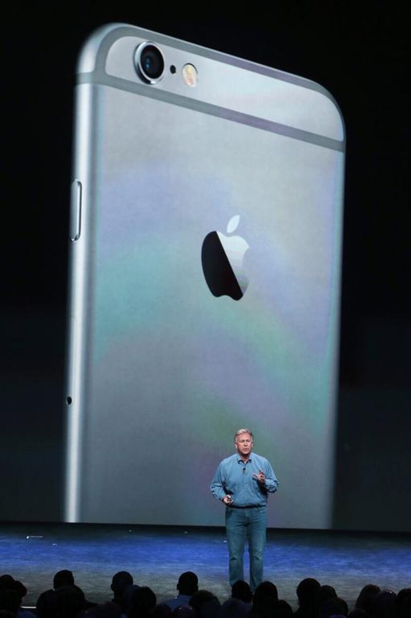 Apple’s Senior Vice President of Worldwide Marketing Phil Schiller announces the new iPhone 6 during an Apple special event at the Flint Center for the Performing Arts. Justin Sullivan / Getty Images/ AFP