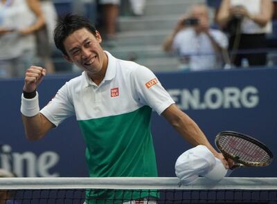 Kei Nishikori of Japan celebrates his victory over Marin Cilic of Croatia during their US Open tennis men's singles quarterfinals match on September 5, 2018 in New York. - Nishikori and Naomi Osaka made history at the US Open on Wednesday when they became the first Japanese man and woman to reach the semifinals of the same Grand Slam. (Photo by kena betancur / AFP)