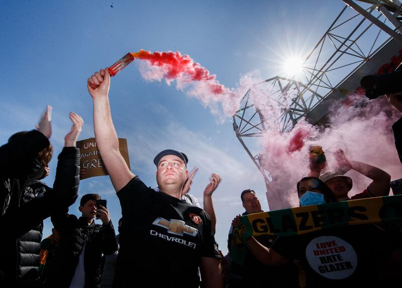 Manchester United fans during a protest against the club owners outside Old Trafford. PA