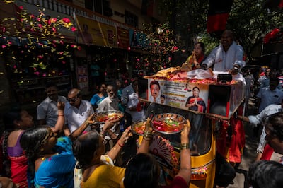 Dravida Munnetra Kazhagam candidate Thamizhachi Thangapandian riding on an auto rickshaw in Chennai, Tamil Nadu. AP
