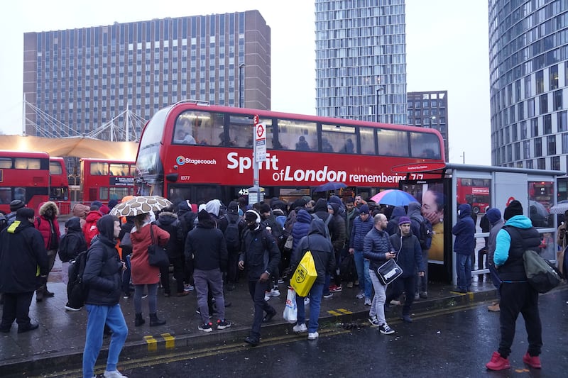 Crowds queue for a bus at Stratford Station in east London during a strike by members of the Rail, Maritime and Transport union on Tuesday. Photo: PA