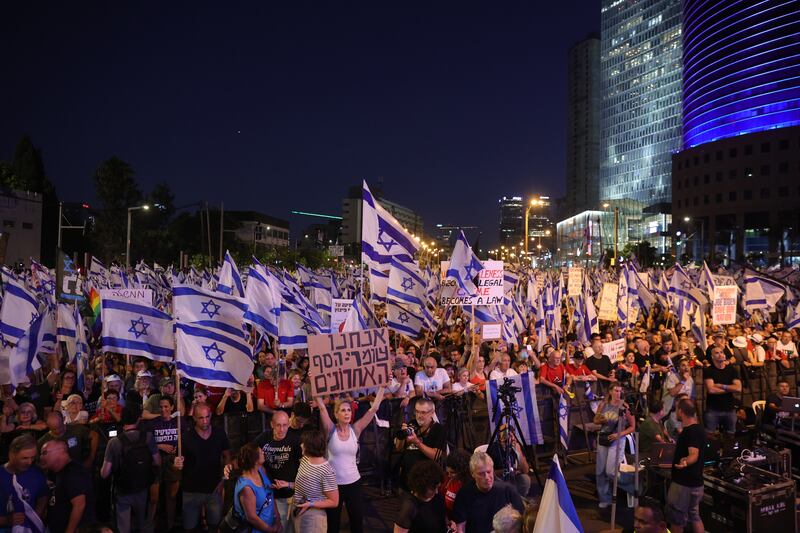 Israelis take part in a demonstration against Israeli Prime Minister Benjamin Netanyahu and his nationalist coalition government's judicial overhaul, in Tel Aviv. EPA
