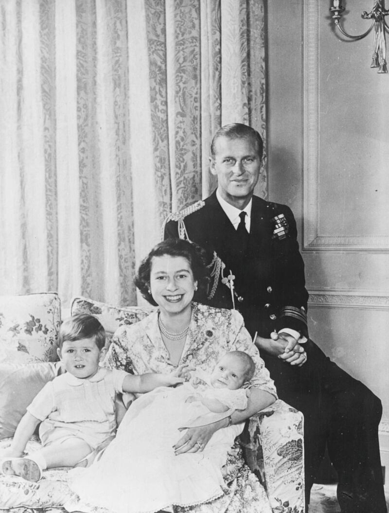 Portrait of Princess Elizabeth and Prince Philip with their baby daughter Princess Anne and son Prince Charles, following the baby's christening at Buckingham Palace, London, October 21st 1950. (Photo by Central Press/Hulton Archive/Getty Images)