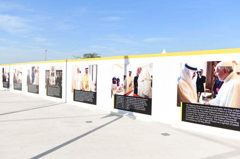 Photos of Pope Francis and rulers of Bahrain at Cathedral of our Lady of Arabia.  Khushnum Bhandari / The National

