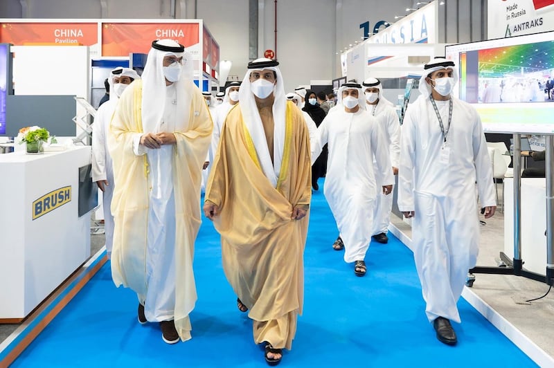 Sheikh Mansour bin Zayed and Dr Sultan Al Jaber take in the atmosphere at the 37th Adipec. Photo: @HHMansour via Twitter