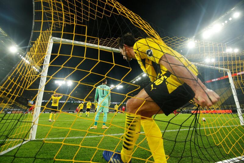 Dortmund players after Bayern Munich's David Alaba scores their first goal. Reuters