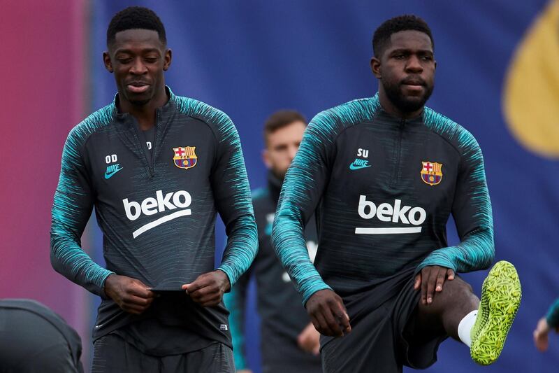 epa07940242 FC Barcelona's players Ousmane Dembele (L) and Samuel Umtiti (R) attend a team's training session at Joan Gamper sport complex in Sant Joan Despi, Barcelona, Spain, 22 October 2019. The club prepares its upcoming UEFA Champions League group round soccer match against Slavia Prague at Prague's Eden Arena Stadium on 23 October.  EPA/Alejandro Garcia