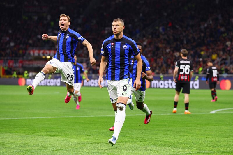 MILAN, ITALY - MAY 10: Edin Dzeko of FC Internazionale celebrates with teammates after scoring the team's first goal during the UEFA Champions League semi-final first leg match between AC Milan and FC Internazionale at San Siro on May 10, 2023 in Milan, Italy. (Photo by Clive Rose / Getty Images)