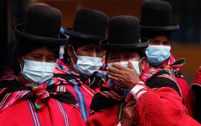 Aymara Indigenous women wait to enter the archaeological museum in Tiwanaku, Bolivia. AP Photo