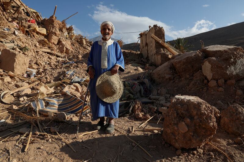 An elderly man is surrounded by rubble in Tikht village, Morocco, days after the quake struck. Reuters