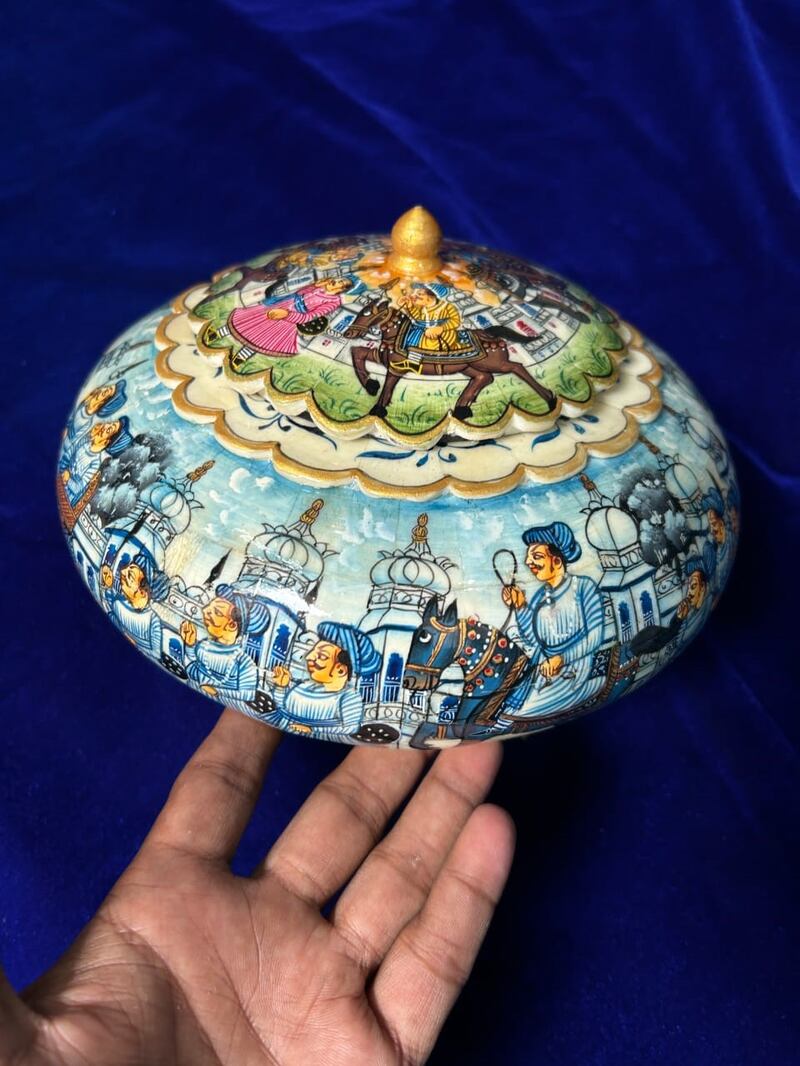 A Mughal style powder box recreating scenes from royal courts