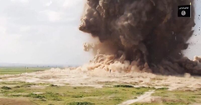 An undated screen grab taken from a video released by ISIL allegedly shows the destruction of the ancient Iraqi town of Nimrud, 30 kilometres south-east of Mosul. ISIL, Handout/EPA