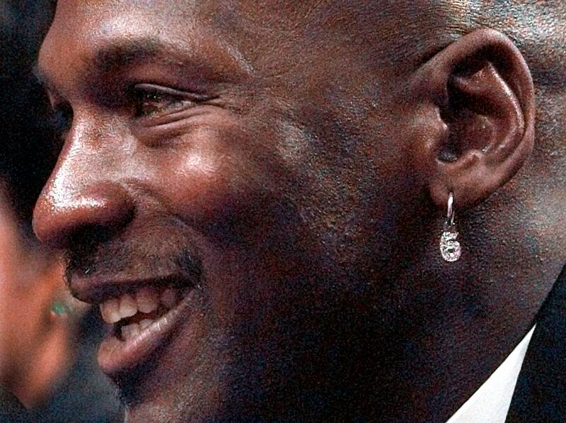 Jordan sports a six-shaped diamond earring for his six NBA championships. AP