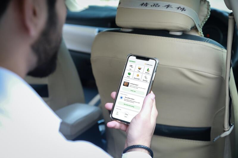 A customer looks at different services on the Careem app. Image courtesy of Careem