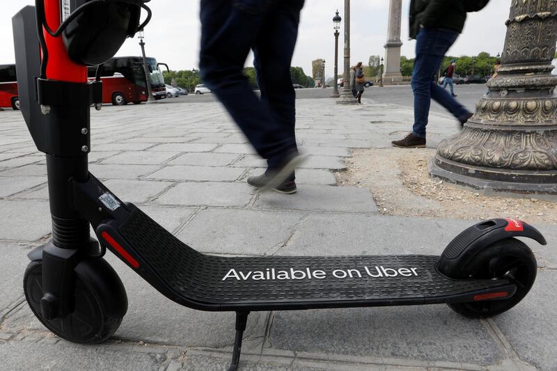 An Uber Technologies Inc. Jump electric Scooter is parked for rent Place de la Concorde in Paris, France, April 12, 2019.   REUTERS/Charles Platiau