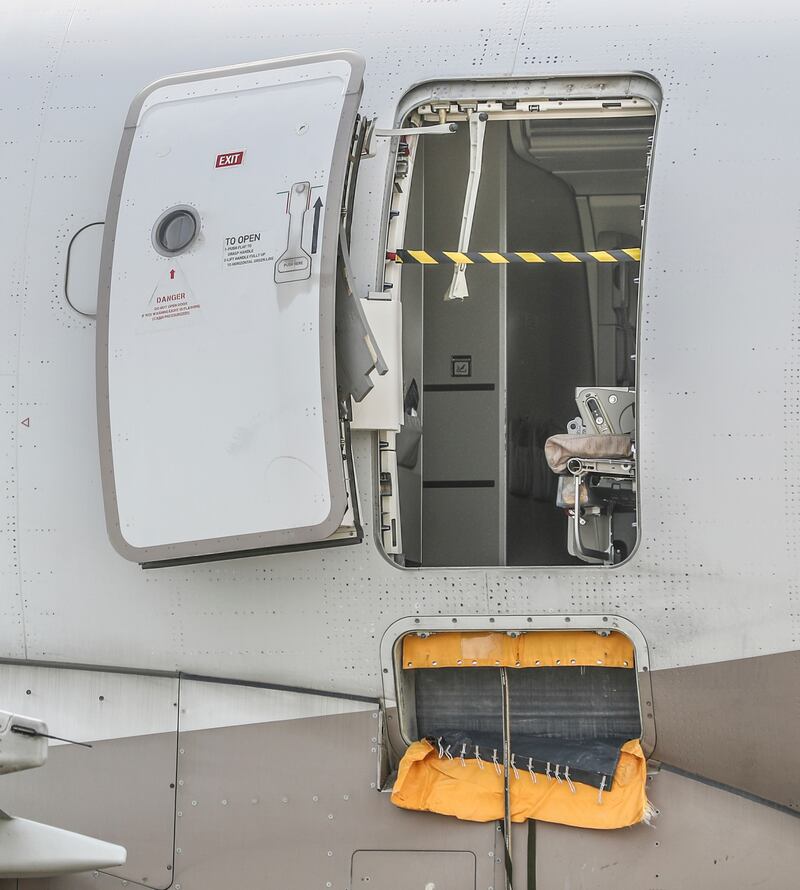 The emergency exit on the Asiana Airlines plane after a passenger opened it during a flight. The plane landed safely. AP