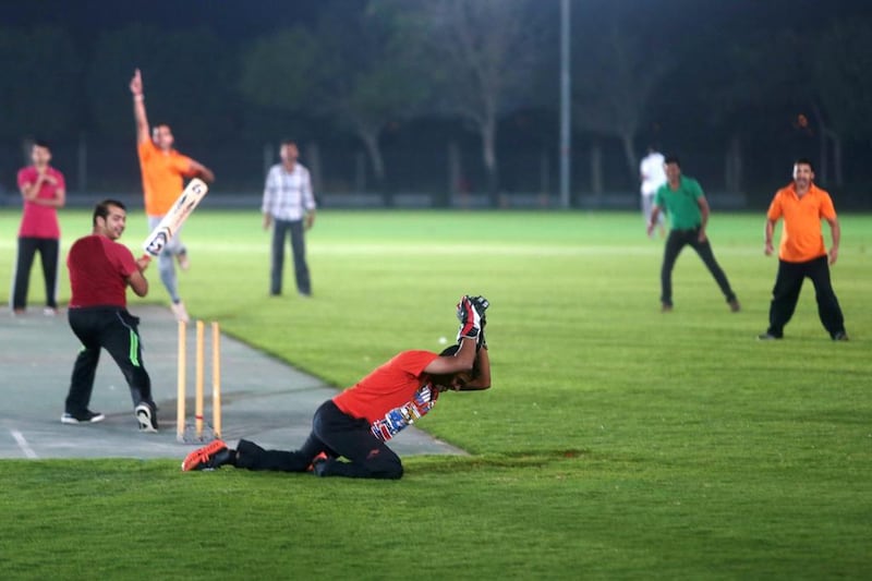 Residents of the Saadiyat Accommodation Village play cricket in the evening on the large sports field located on site. Christopher Pike / The National