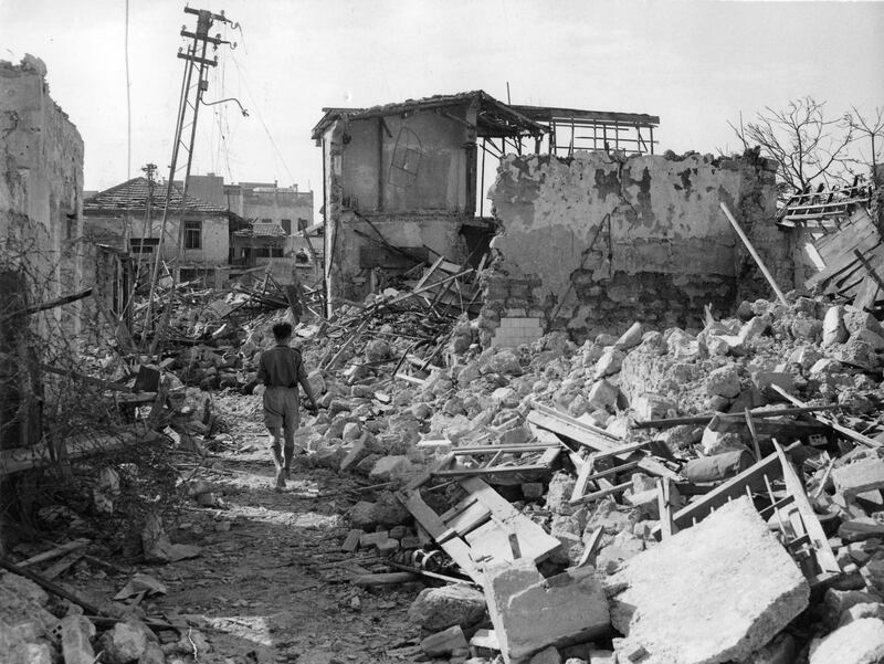 Picture shows the destruction in the captured Manshiah quarter in Jaffa, Palestine, May 8, 1948. The sector was taken from the Arabs by Irgun Jewish forces after fierce fighting. It was British intervention, that finally brought a cease fire May 2, 1948. (AP Photo/Malmed)