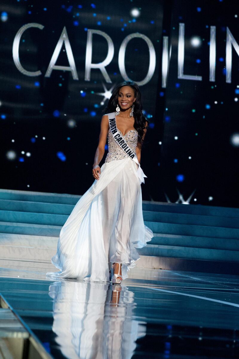 Miss North Carolina USA 2013, Ashley Love-Mills competes in her evening gown during the 2013 MISS USA Competition Preliminary Show at PH Live in Las Vegas, Nevada on Wednesday June 12, 2013. She  will compete for the title of Miss USA 2013 and the coveted Miss USA Diamond Nexus Crown LIVE on NBC starting at 9:00 PM ET on June 16th, 2013 from PH Live.  AFP PHOTO / HO/Miss Universe Organization L.P., LLLP. / Patrick PRATHER    == RESTRICTED TO EDITORIAL USE / MANDATORY CREDIT: "AFP PHOTO / MISS UNIVERSE ORGANIZATION" / Patrick Prather / NO SALES / NO MARKETING / NO ADVERTISING CAMPAIGNS / DISTRIBUTED AS A SERVICE TO CLIENTS =
 *** Local Caption ***  333104-01-08.jpg