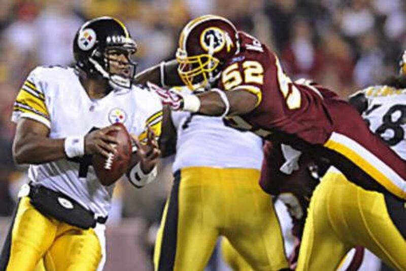 The Washington Redskins linebacker Rocky McIntosh leaps for the Pittsburgh Steelers quarterback Byron Leftwich during their game on Monday, which the Steelers won.