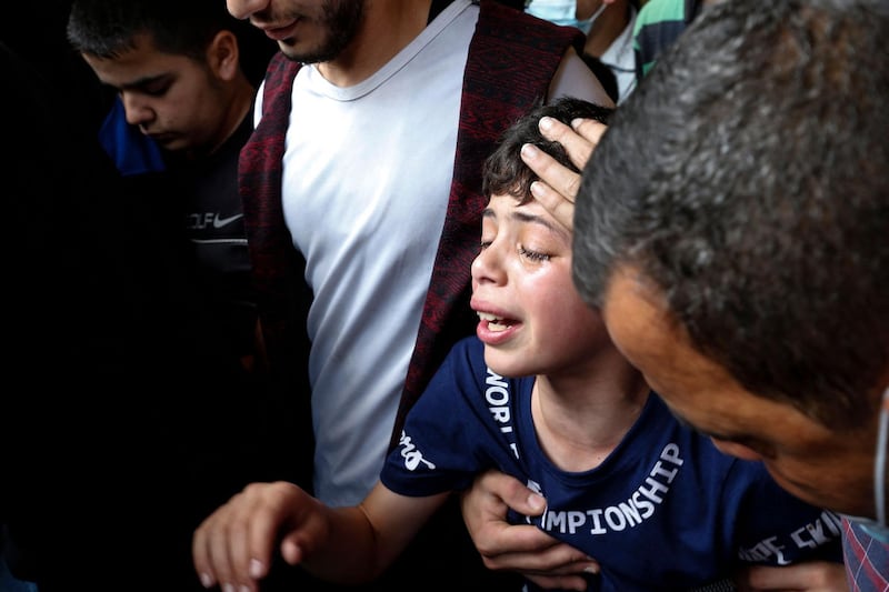 Palestinians mourn during a funeral in Jabalia in the northern Gaza Strip. AFP